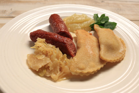 Paleo Pierogies Served with Sauerkraut and Polish Sausage