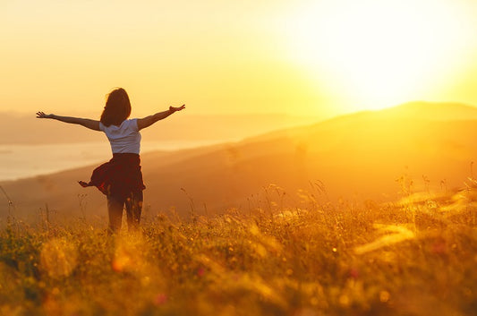 Psoriasis Triggers - Woman Standing in the Sun