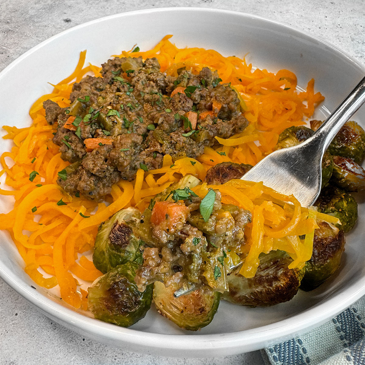 grass-fed beef bolognese butternut squash noodles roasted brussels sprouts aip paleo